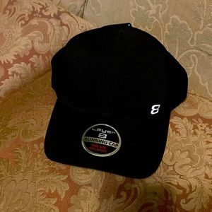 Layer 8 black running cap. Moisture wicking and reflective details. One size.